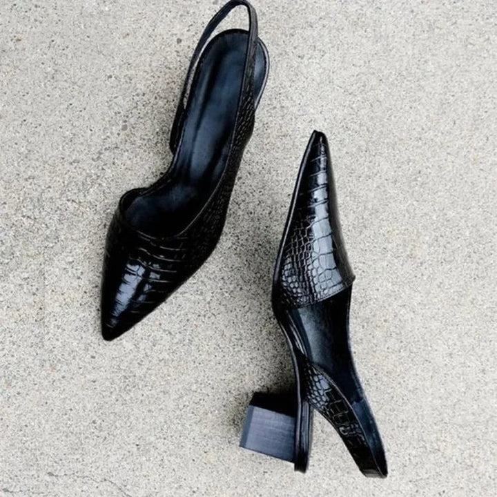 Pair of croc-embossed slingback pumps top and side view