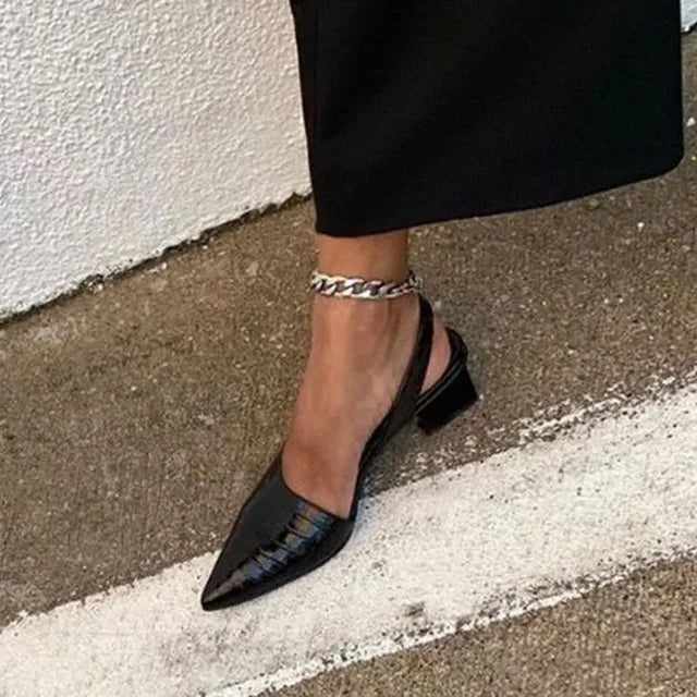 Croc-effect slingback pump worn side view