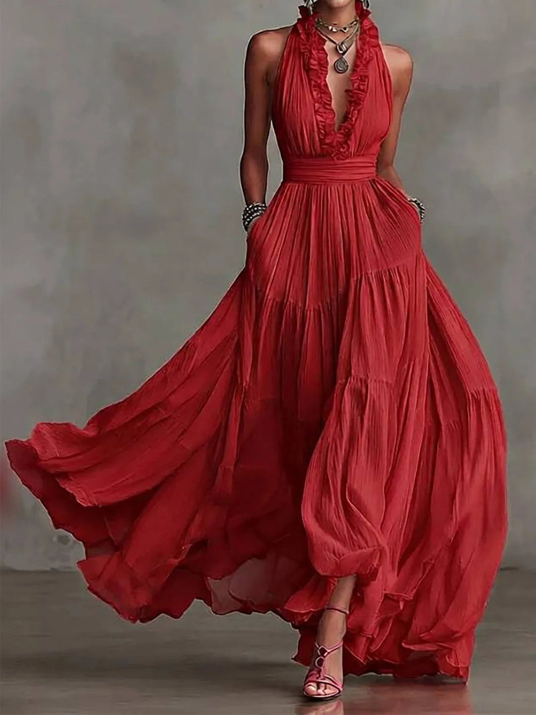 Evening maxi dress with ruffle neckline and pleated tiered skirt front view