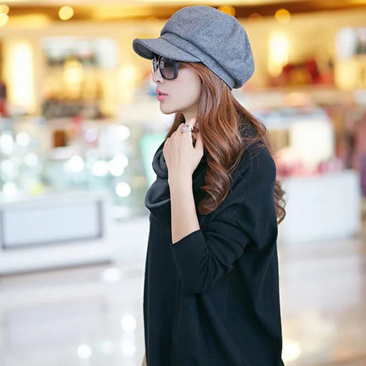 Octagonal newsboy cap styled side view