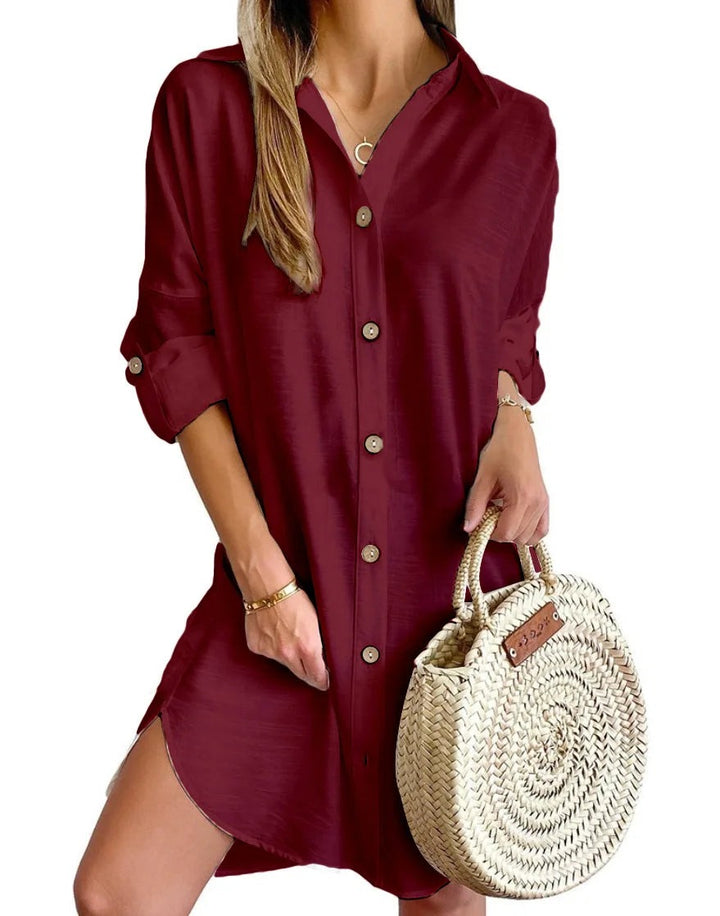 Loose button up shirt dress with shirttail hem front view