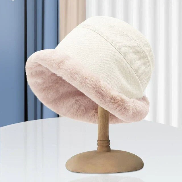 Faux fur trim winter bucket hat front view on stand