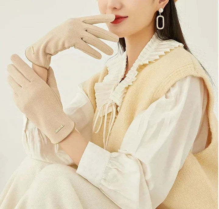Winter gloves with piped cuff worn view