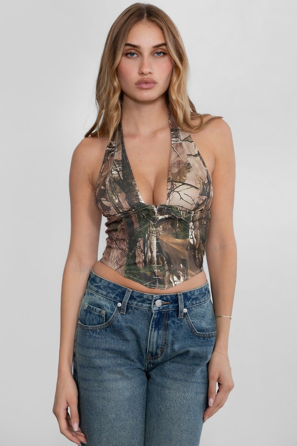 Women's camo print halter corset top angled front view