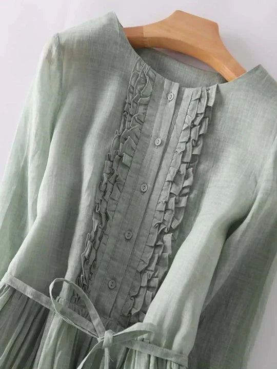 Ruffle front and button placket detail