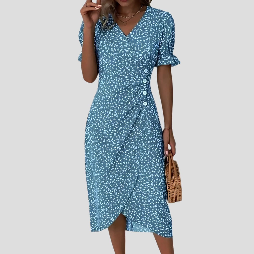 Women's Short Sleeve Printed Midi Dress with Button Side Wrap Hem shown in Blue